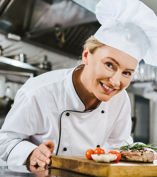Cook smiling with food