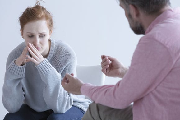Woman talking to a doctor