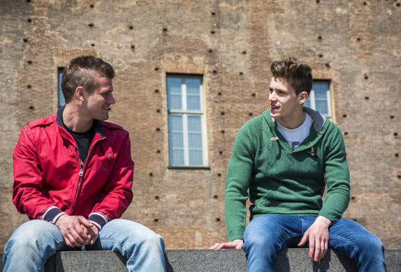 Two men talking about addiction issues